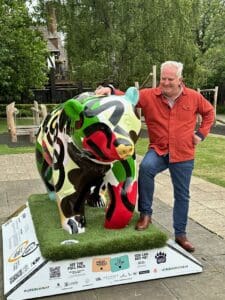 Mark Davies, Chairman of ThinkOTB with Bloom the Leeds Bear Hunt bear